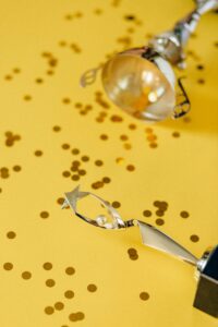 Trophy on it's side with confetti out.